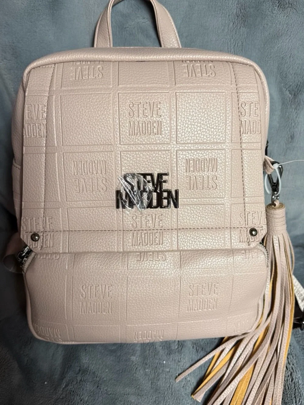 Steve Madden Pale Blush Embossed Leather Backpack with Tassel